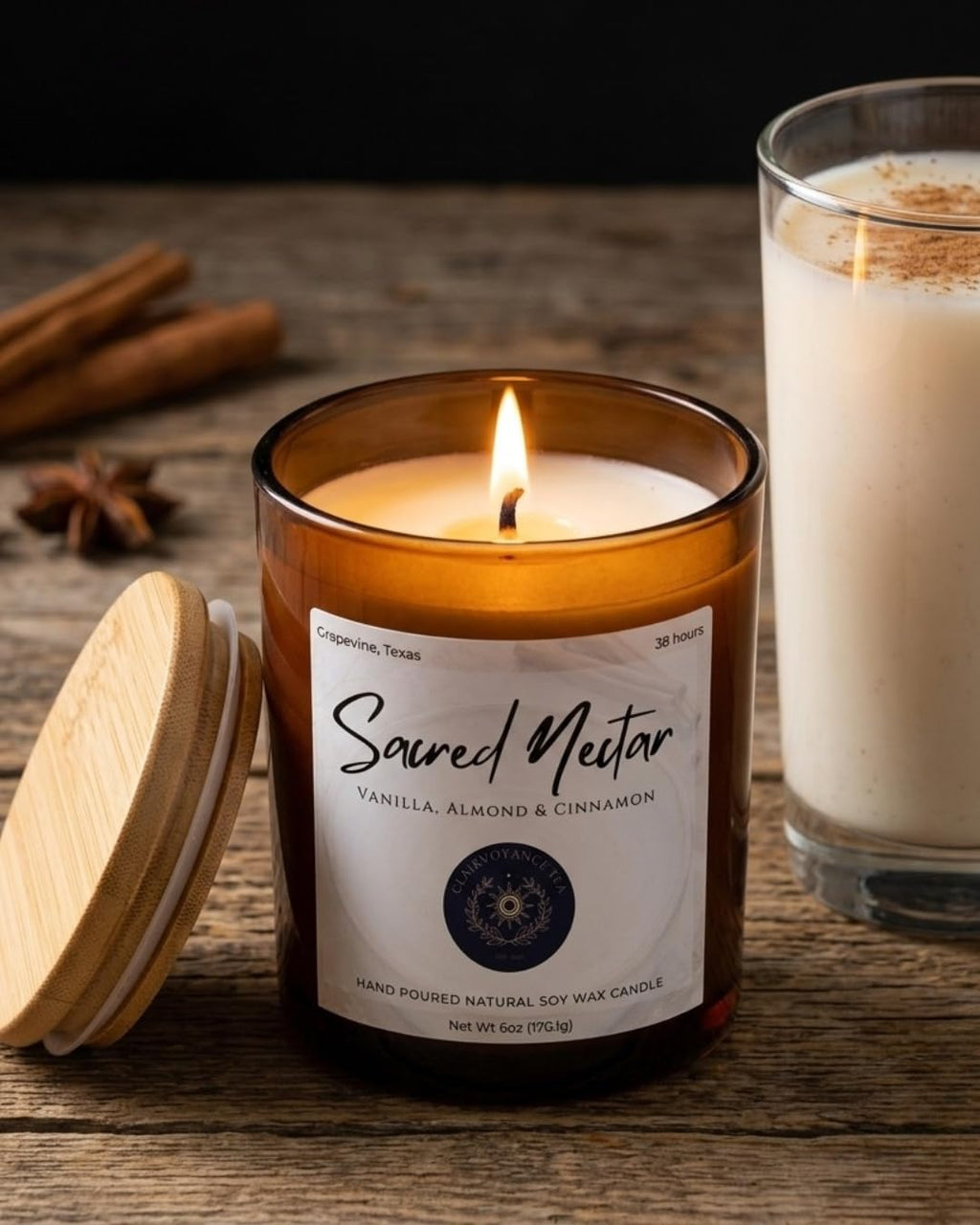 Sacred Nectar hand-poured soy wax candle in amber glass jar