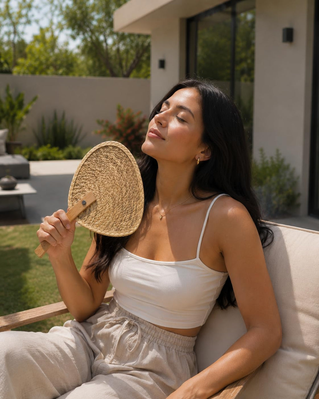 Handwoven natural palm leaf fan