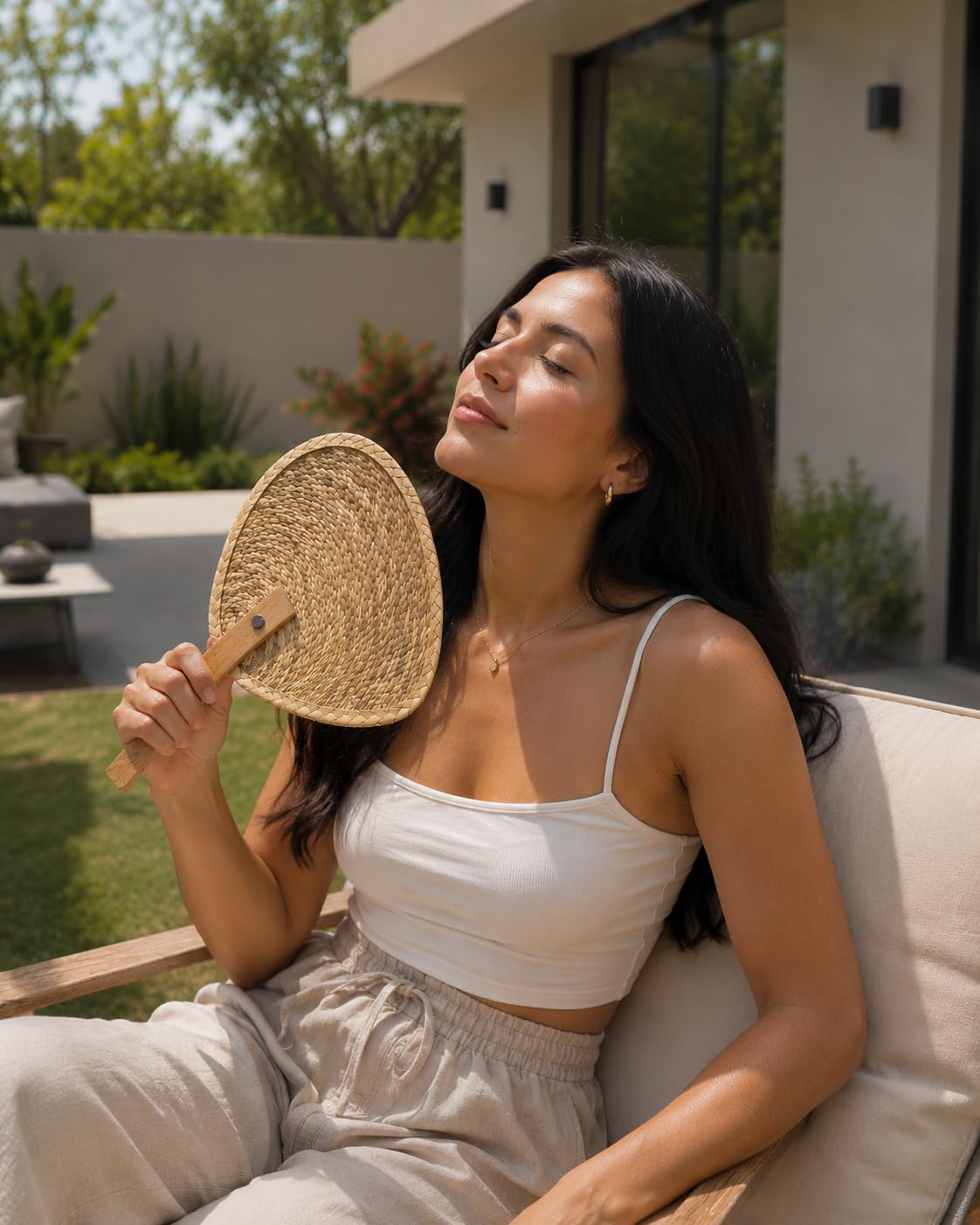 Handwoven natural palm leaf fan