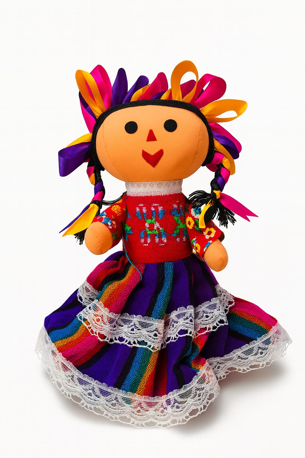 Hand-sewn Mexican Lele rag figurine in traditional folk-art clothing