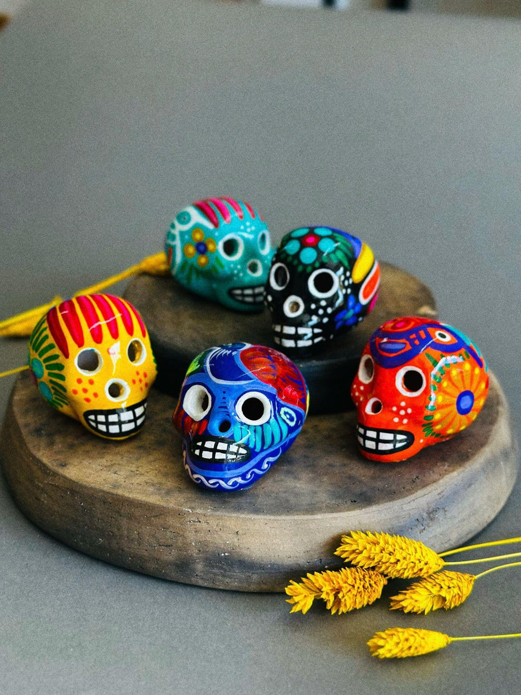 Hand-painted Oaxacan skull wood carvings, set of 5