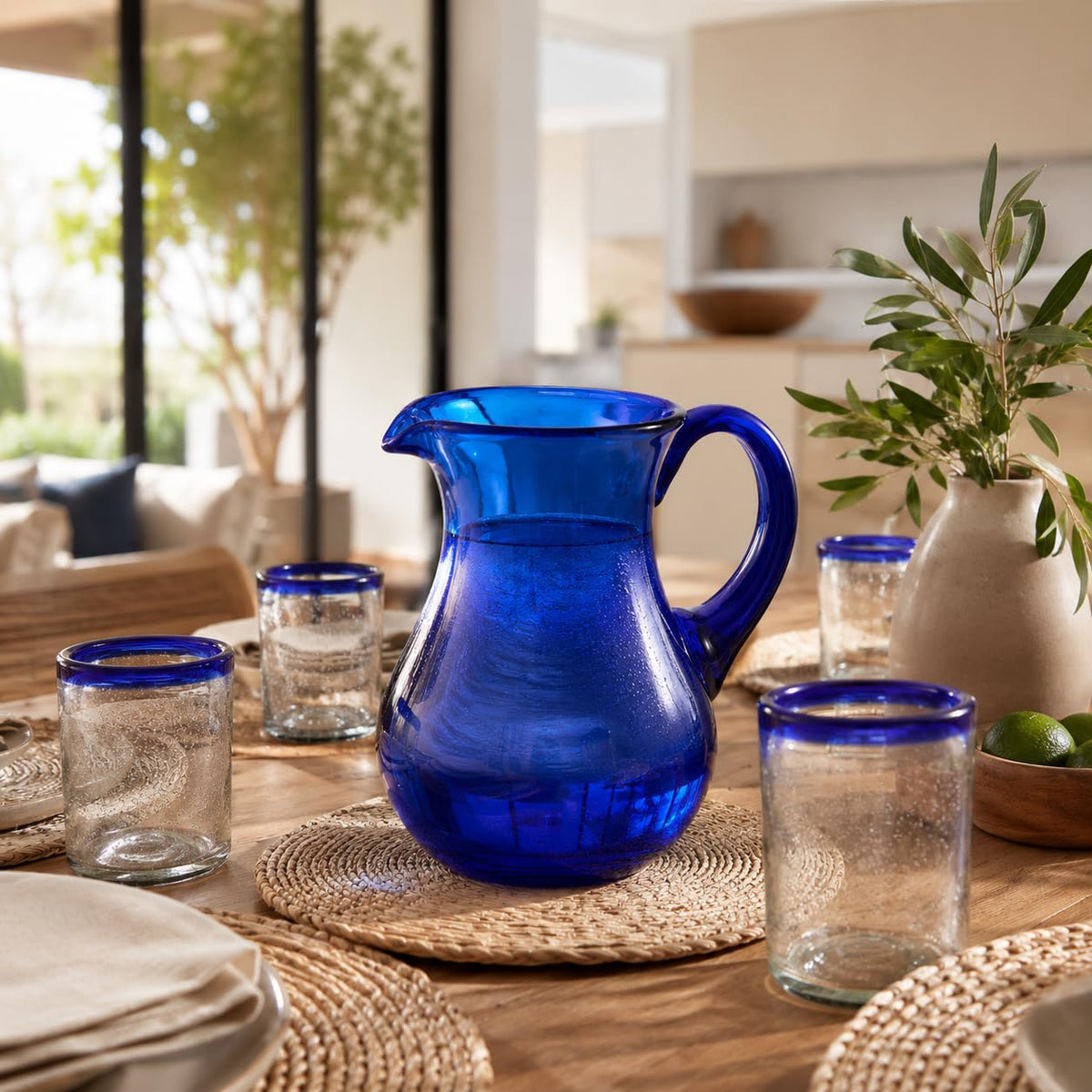 Hand-blown cobalt blue glass water pitcher, pear shape