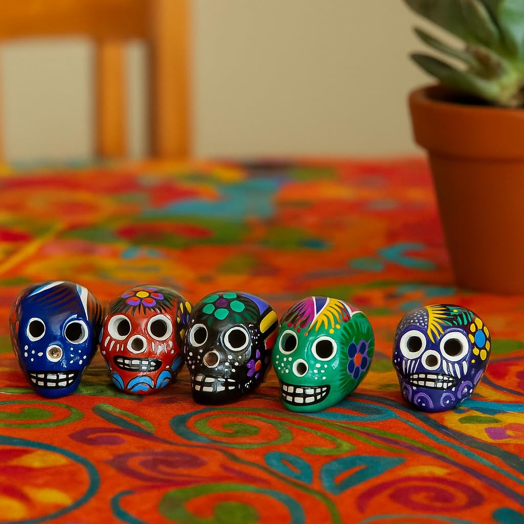 Hand-painted Oaxacan skull wood carvings, set of 5