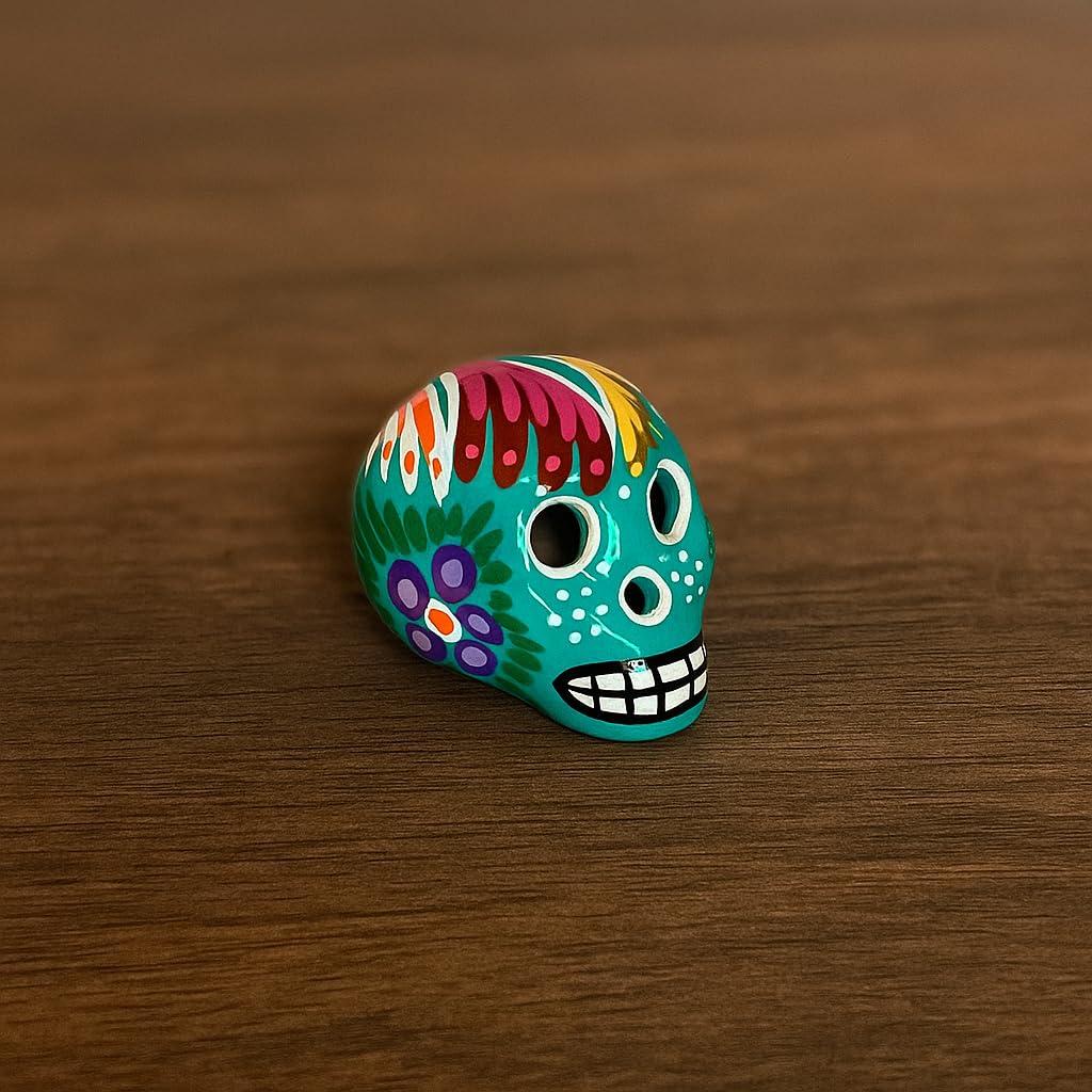 Hand-painted Oaxacan skull wood carvings, set of 5
